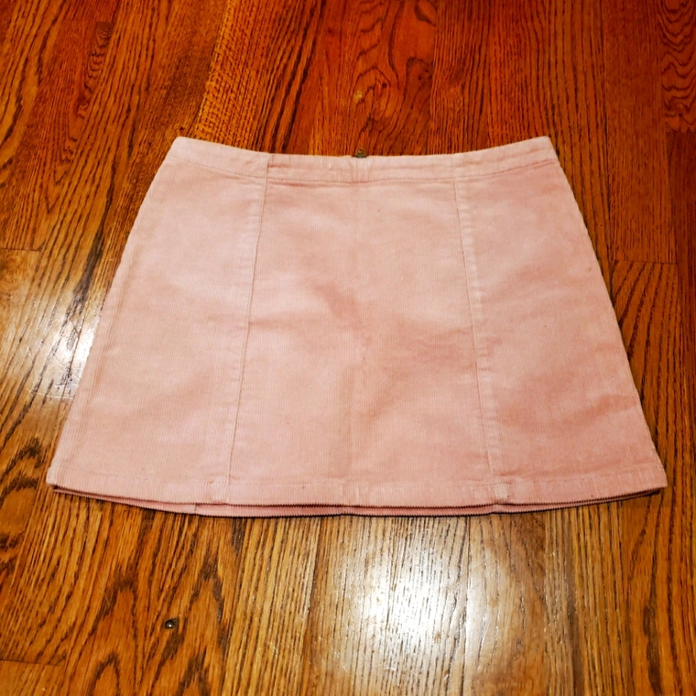Pink corduroy mini skirt.